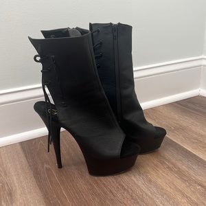 Black “Pleasers” platform heels